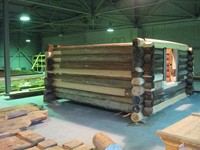 Assembly of the restored portion of the log framework in the assembly department in the Complex
