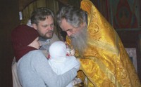 Таинство крещения в церкви Покрова Пресвятой Богородицы  в Кижах