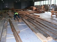 photo 7. General view of the assembly department with the  Church ﬂoor components being spread and prepared for restoration.